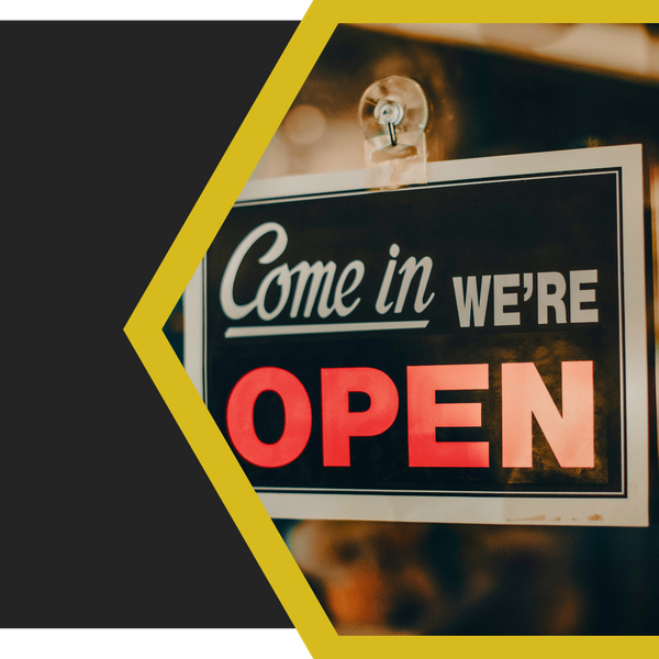 open sign on a commercial building