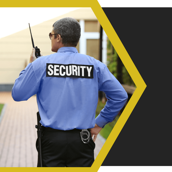 security guard speaking on his radio