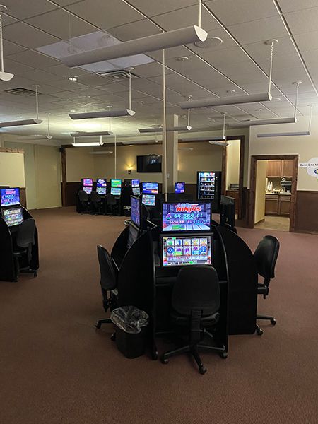 a sweepstates location game floor with many slot machines