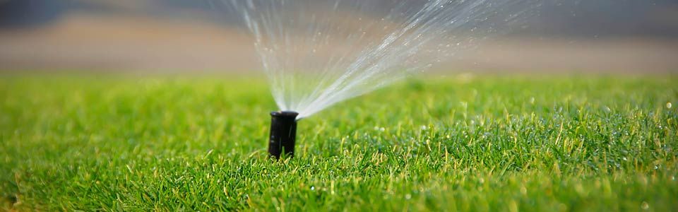 This image showcases a smart irrigation system installed by Stirling Electric & Irrigation at a high-end home in Bellaire, Texas (ZIP 77401). The system includes a WiFi-enabled controller for remote water management, designed to support water conservation while maintaining a healthy, vibrant landscape. Smart irrigation system installation at a residential property in Bellaire, TX by Stirling Electric & Irrigation