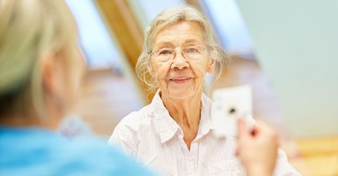 A woman playing card games.
