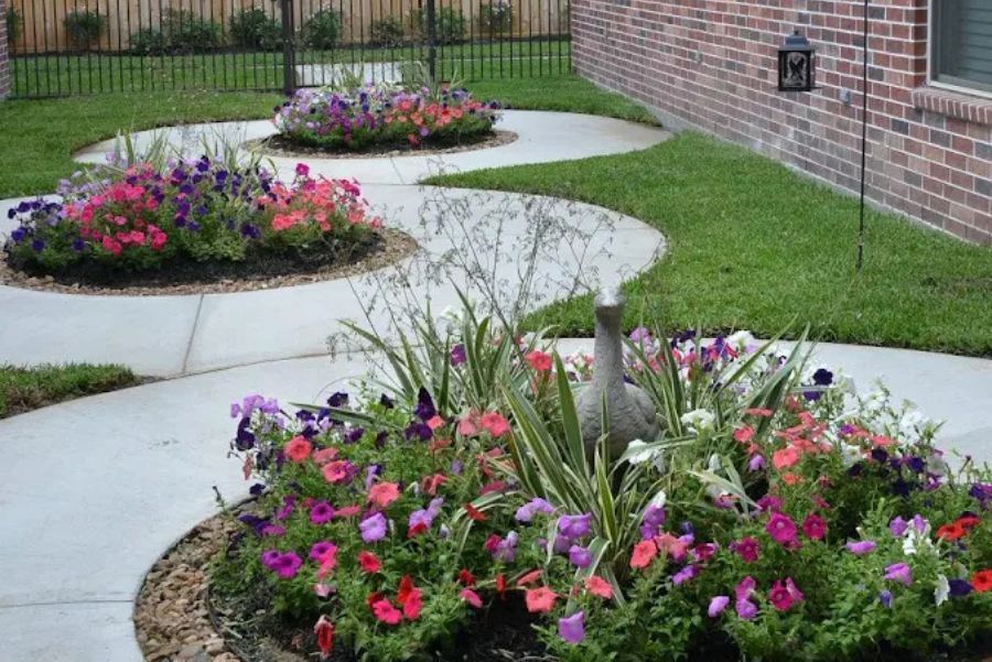 landscaped courtyard with flowers landscaped courtyard with flowers