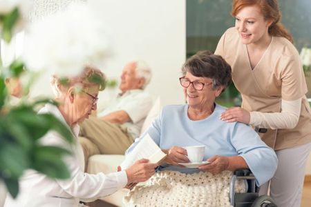 residents reading and having tea