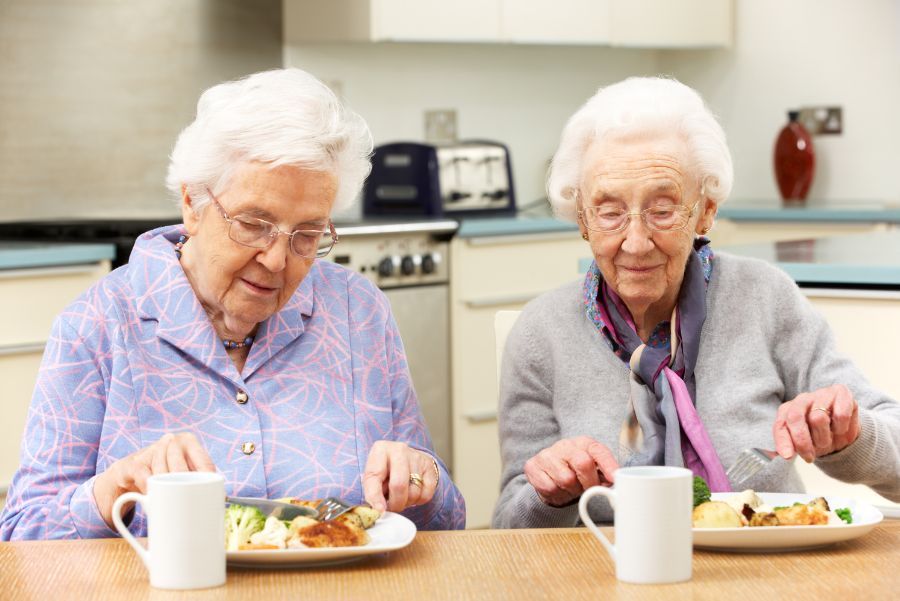 two women eating together Why Choose Us.jpg