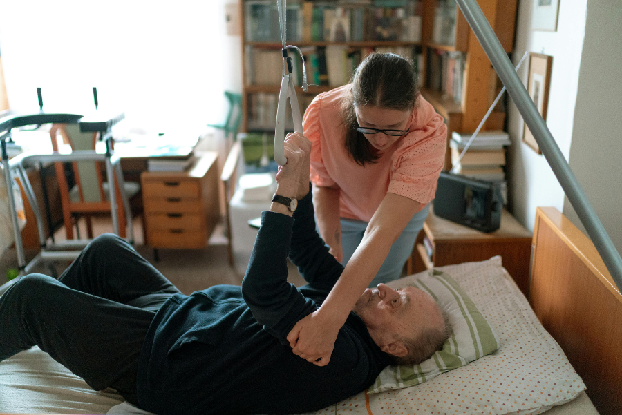 Caregiver assisting a patient