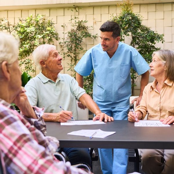 Memory care facility nurse and patients.
