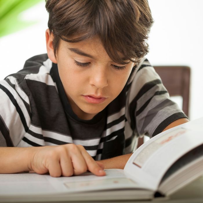 image of a kid reading