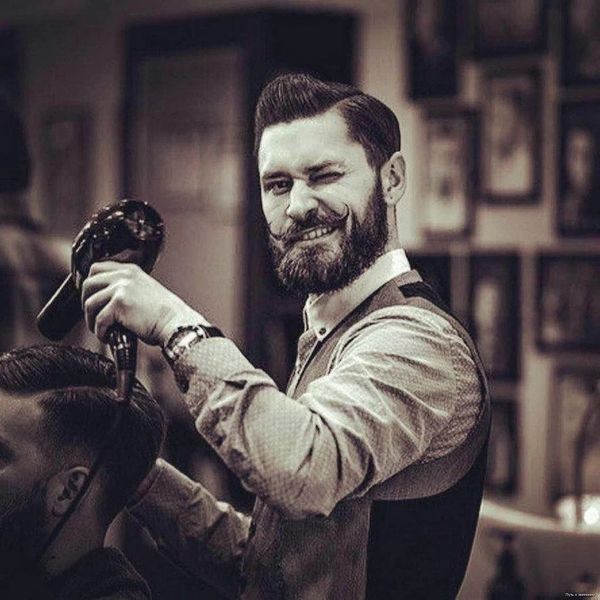 barber with pompadour and beard