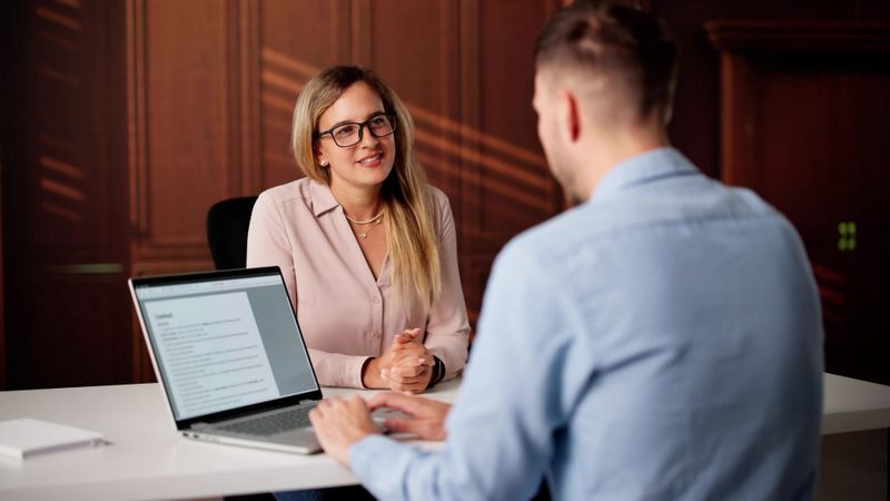 lawyer speaking with woman
