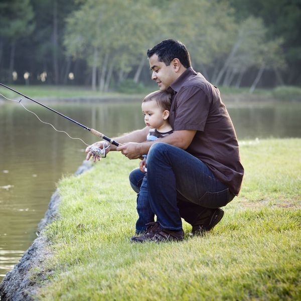 father fishing with son