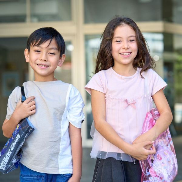 two kids ready for school