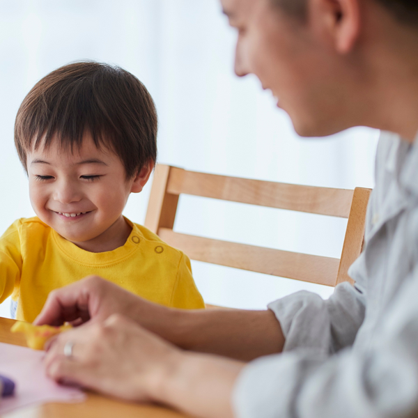 sitting at table The Importance of a Parenting Plan in APR4.png