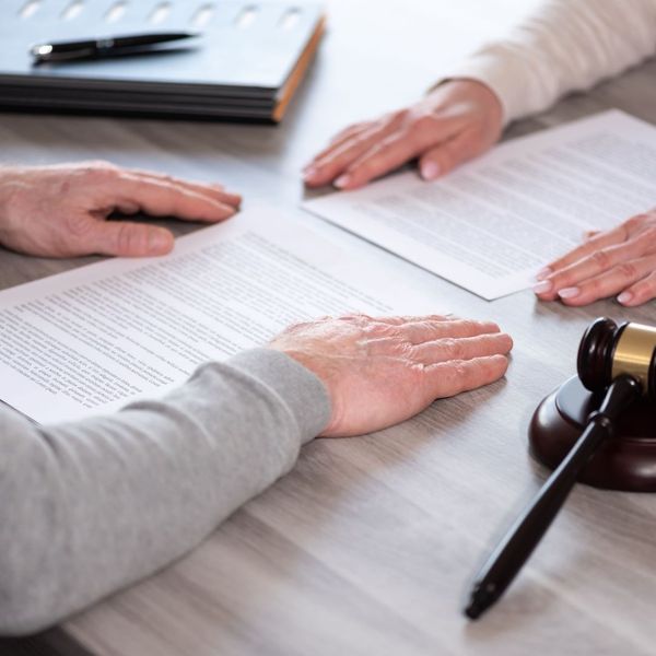 couple working with lawyer for divorce