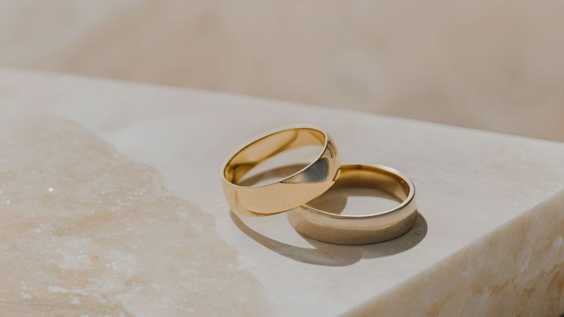 wedding ring resting on stone wedding ring resting on stone