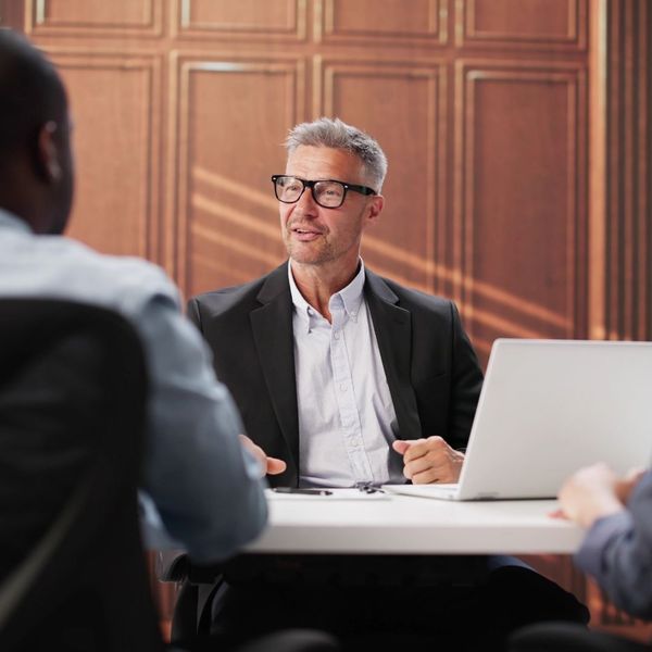 lawyer working with couple divorcing