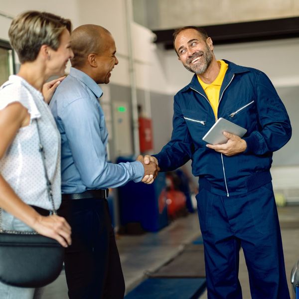 Customers at auto body repair shop