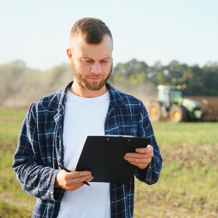 farmer looking at finances