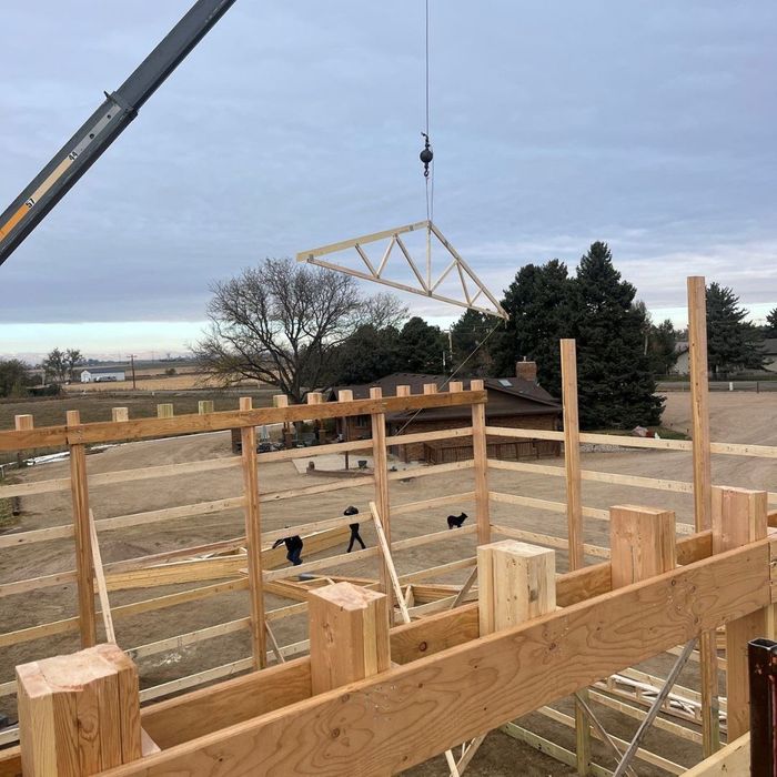 trusses being attached to roof