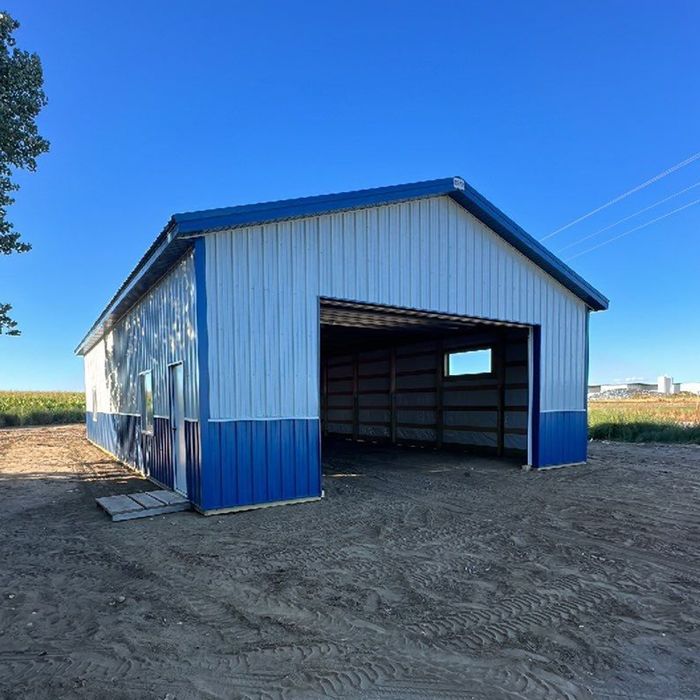 White and blue horse arena exterior