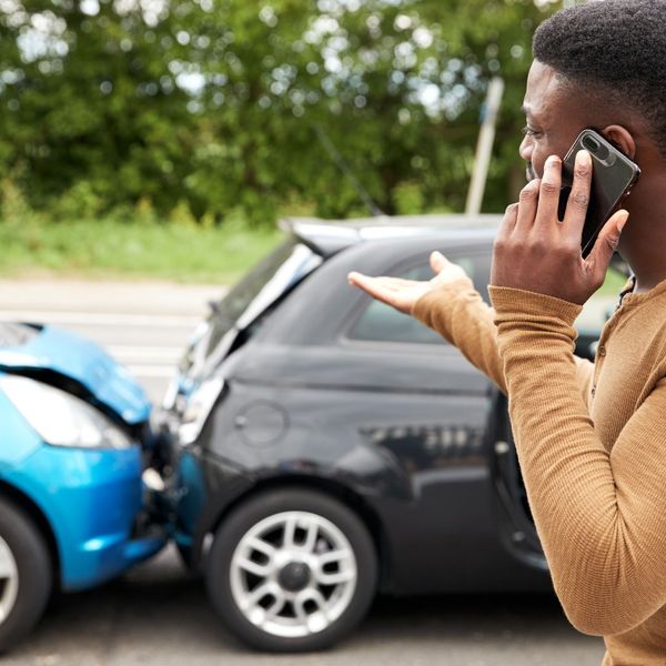 man on the phone after a car accident