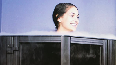 Woman in cryotherapy chamber