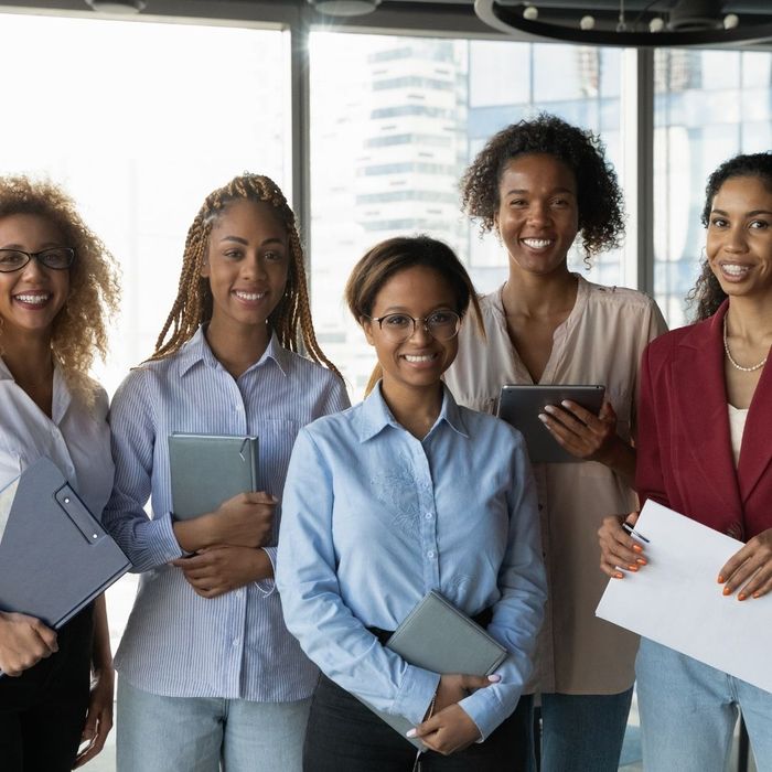 group of smiling professional women