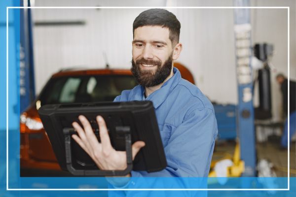Mechanic looking at diagnostics