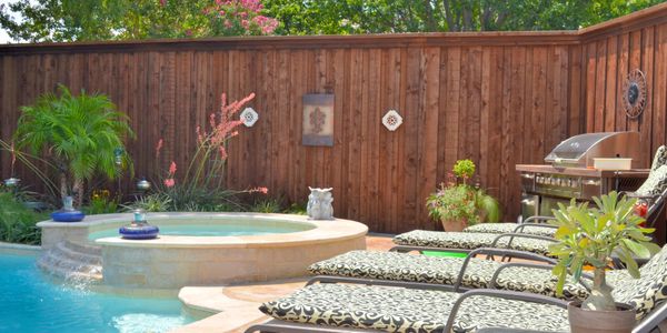 Image of a backyard with a privacy fence
