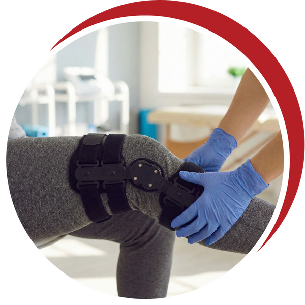 A doctor explaining a knee brace to a patient.