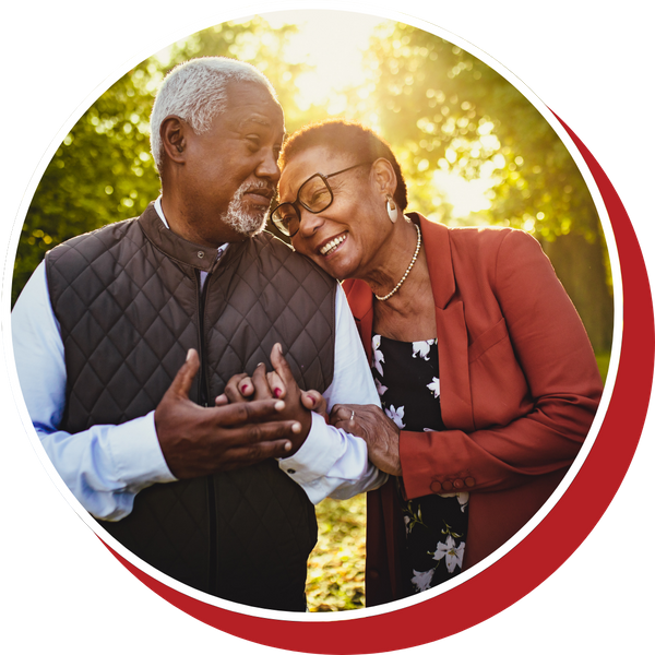 older couple embracing outside