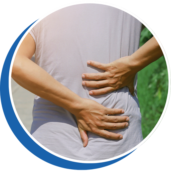 back view of a woman clutching her lower back
