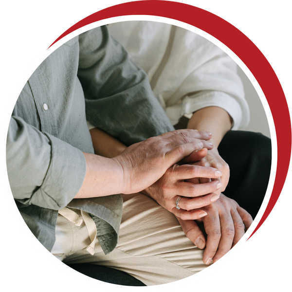 couple holding hands representing support