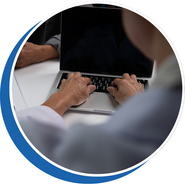 provider working on laptop