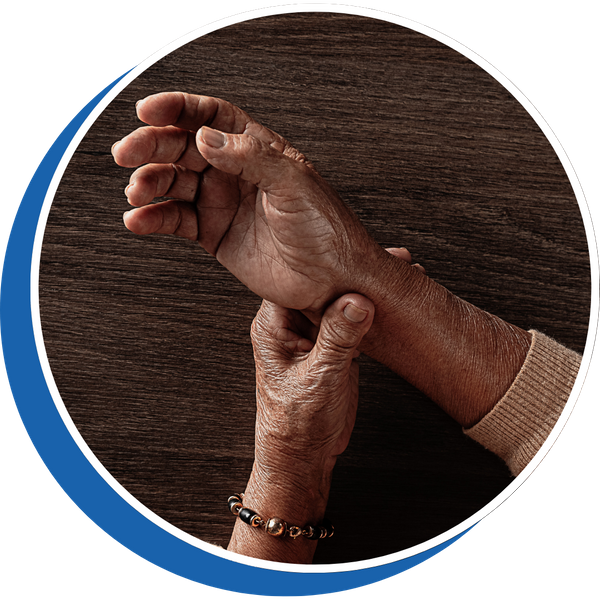 older woman holding her wrist older woman holding her wrist