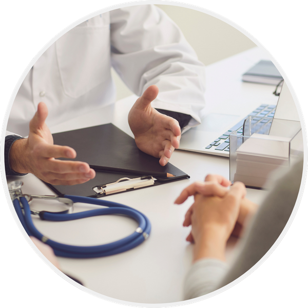A doctor meeting with a patient.