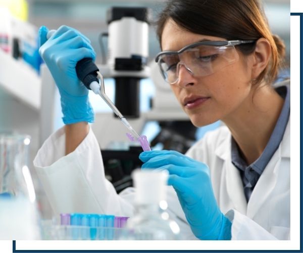 a scientist doing testing in a lab