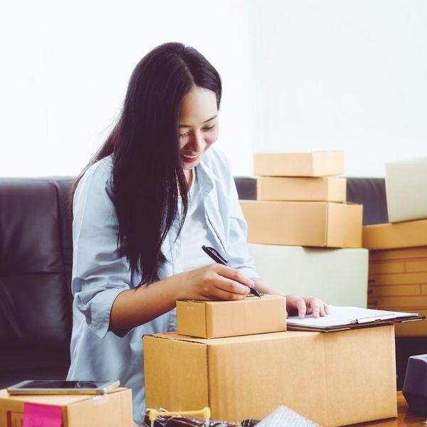 woman packing boxes