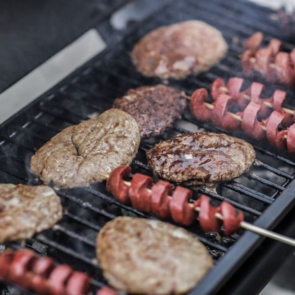 grilling burgers and hot dogs