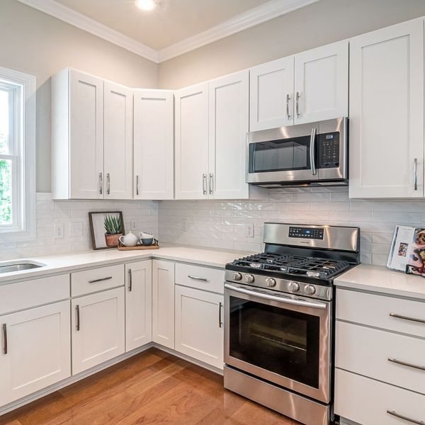 kitchen cabinets with room on top for storage