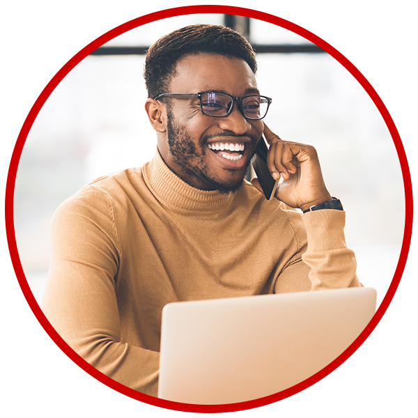 Man on phone smiling thanks for Konnectory Business Coaching