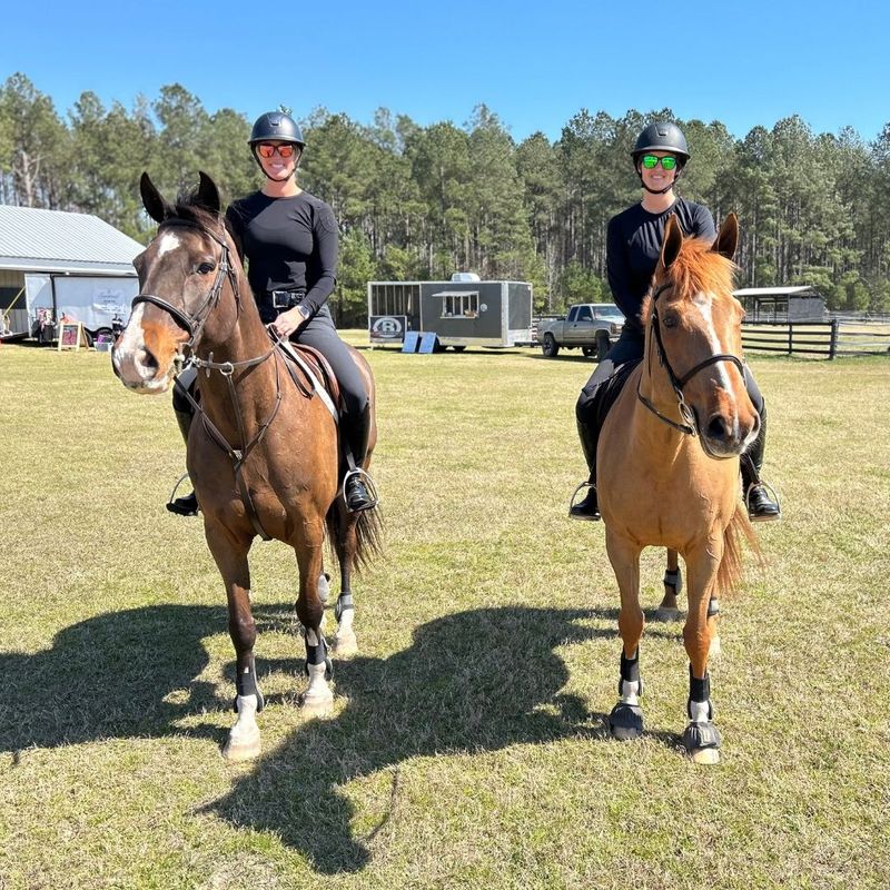 people riding their horses
