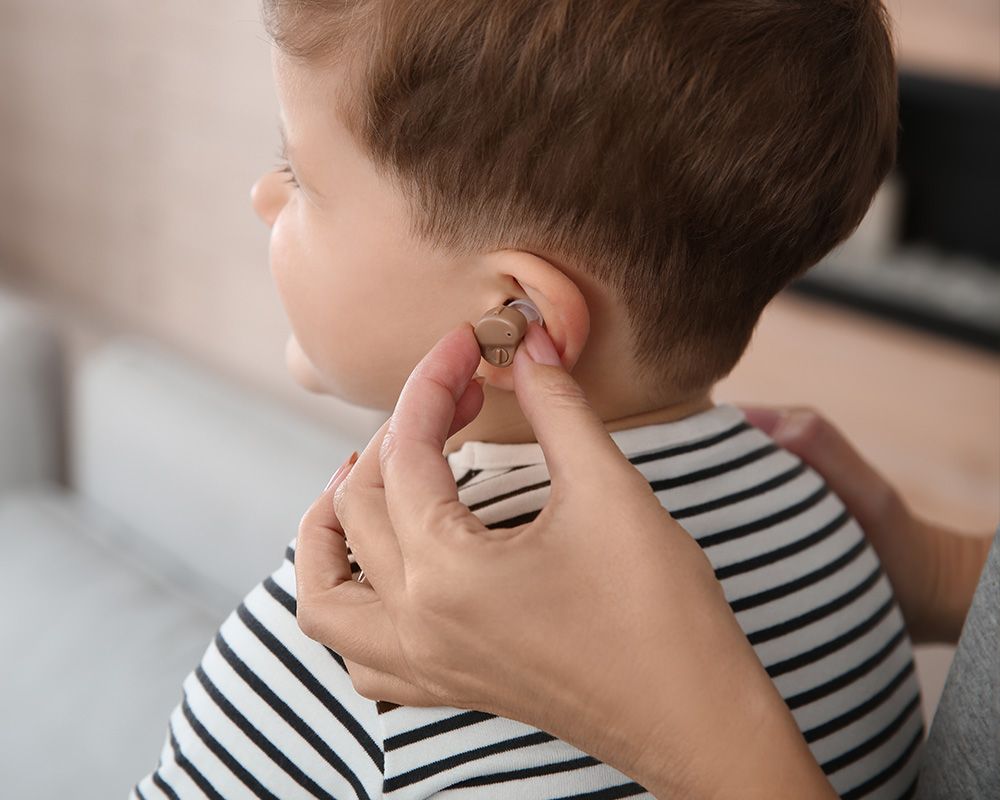 child getting a hearing aid