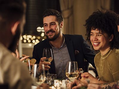 friends talking at dinner