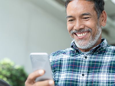 man looking at phones