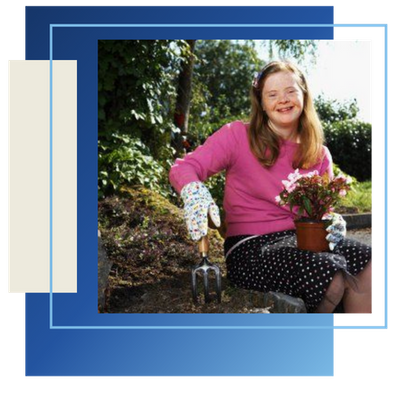 Woman with down syndrome gardening