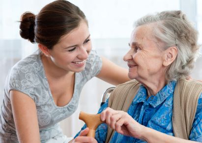 Senior woman with in-home care provider