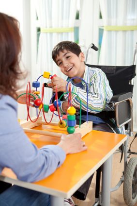 Disabled boy with in-home care provider