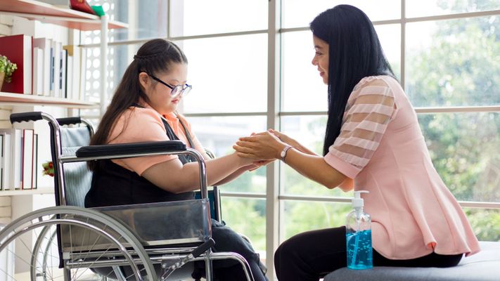 caretaker with patient