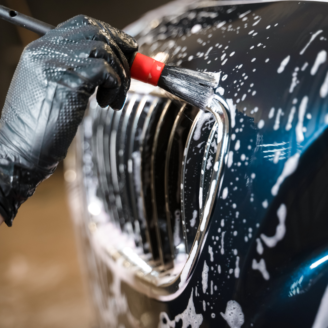 car being carefully cleaned. 