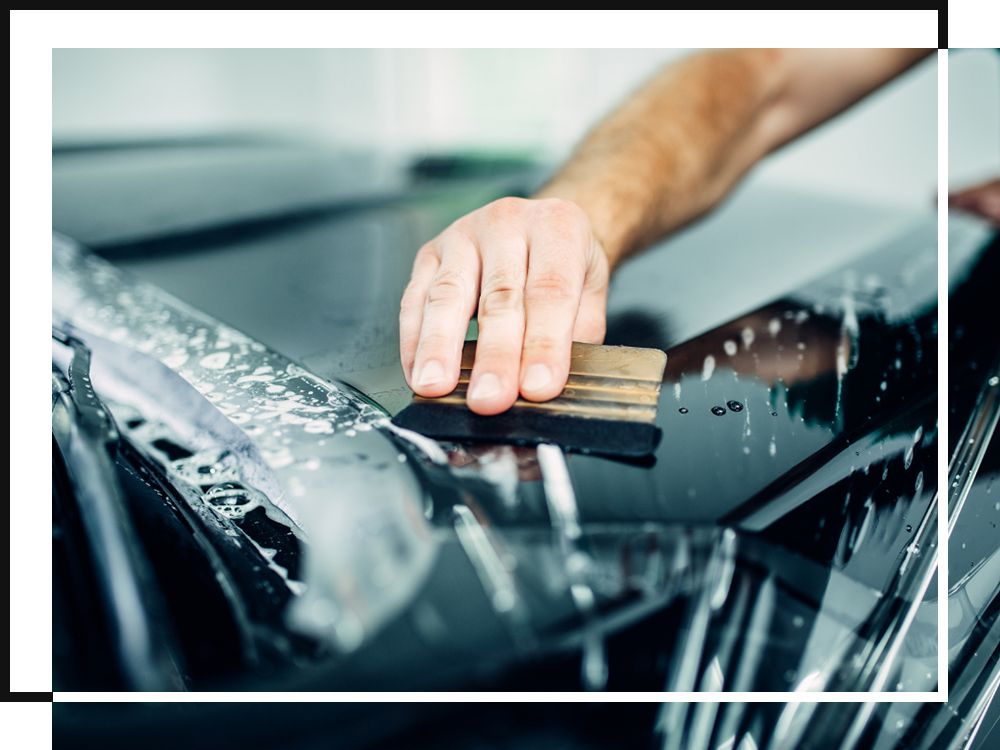 img of a car being wrapped in vinyl Image 1.jpg